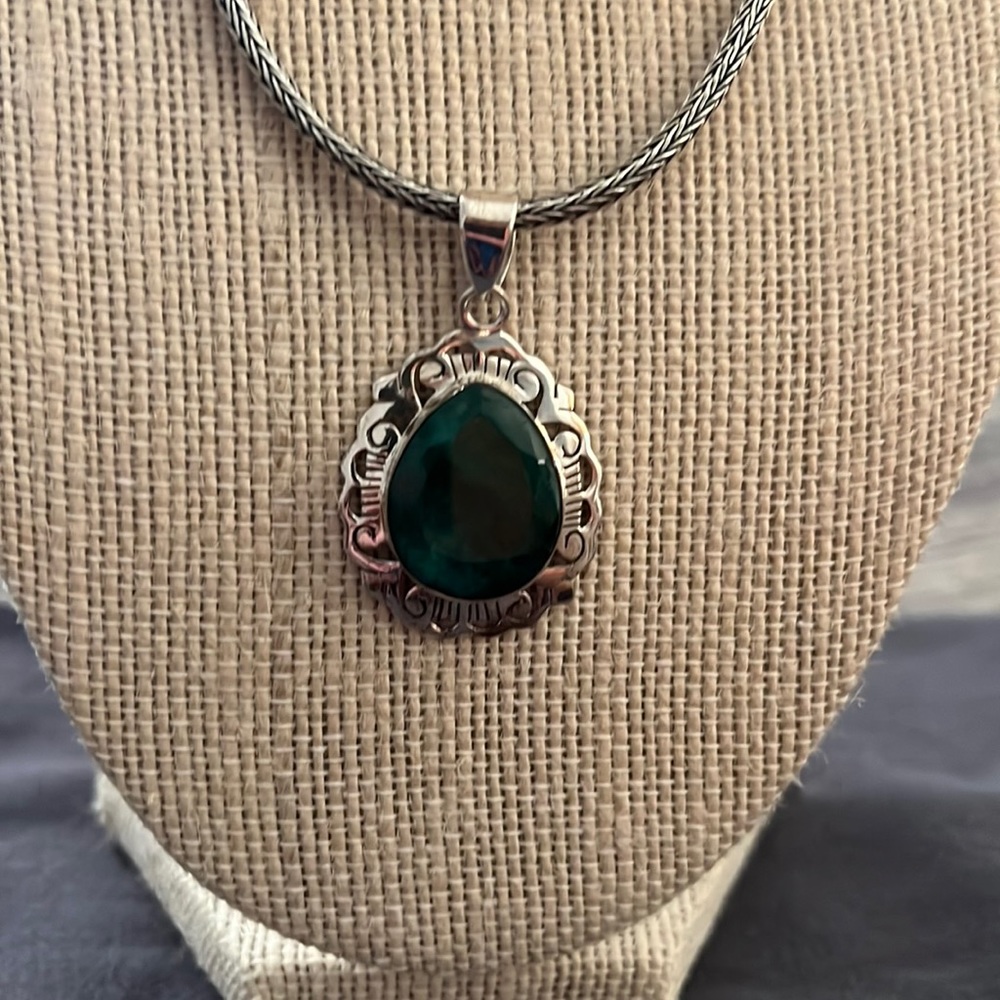 Emerald pendant set in sterling silver